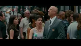 bald man in suit on street — The Dictator