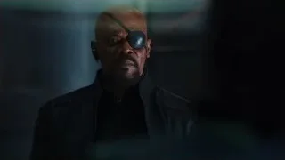 bald man with eye patch in futuristic setting — The Avengers
