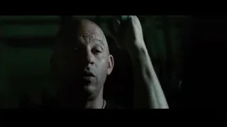 bald man with raised hand — Furious Seven