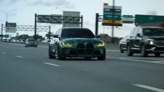 black car driving on highway — Sports Cars