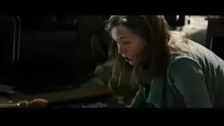 blonde woman crying on couch in dark room — Superman: Man of Steel