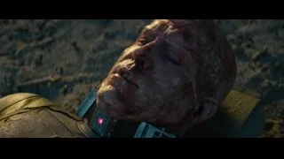 bloody man in black jacket in desert — Deadpool 2