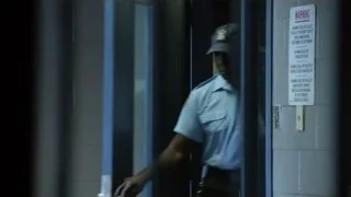 Blue door with warning sign — Suits
