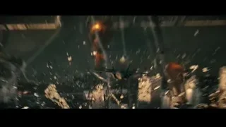 City at night with smoke and two figures — Superman: Man of Steel