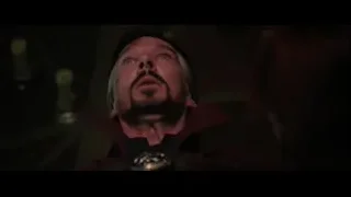 close-up of man's serious face in dark room — Doctor Strange 2