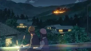 couple on balcony overlooking village fire at night — Your Name