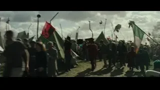 crowd of people in field with flags — Harry Potter and the Goblet of Fire