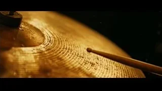cymbal with drumstick and water droplets — Whiplash