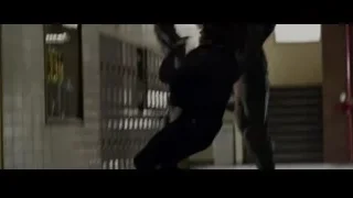 dog sniffing person kneeling in hallway — The Amazing Spider Man