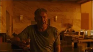 elderly man holding whiskey in dark room — Blade Runner 2049