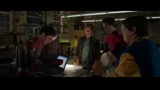 five people gathered around laptop in laboratory — Spiderman: No Way Home