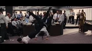 Group of people conversing in office hallway — The Wolf Of Wall Street