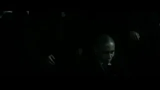 Group of people covering faces in dark room — Harry Potter and the Deathly Hallows 2