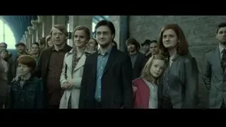 Group of people in arched brick hallway — Harry Potter and the Deathly Hallows 2