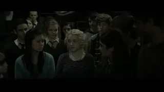 Group of young people in dimly lit library — Harry Potter and the Deathly Hallows 2