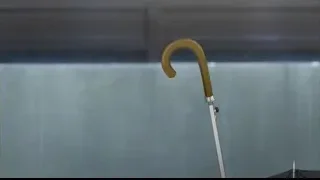 hand holding yellow umbrella — I Want To Eat Your Pancreas