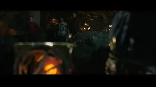 hands holding flaming object in dark room — Spiderman: No Way Home