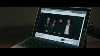 Laptop displaying video of people — Now You See Me 2