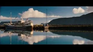 Large fishing boat docked in harbor — The Secret Life of Walter Mitty
