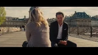 man and woman conversing on Paris boardwalk — Now You See Me