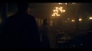 man and woman in dimly lit restaurant — Peaky Blinders