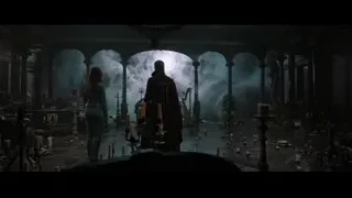 Man and woman in eerie arched room — Doctor Strange 2