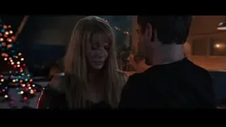 man and woman in room with Christmas tree — Iron Man 3