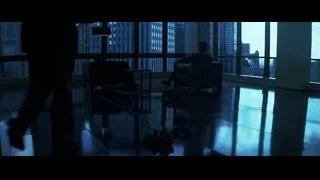 man and woman in room with city view — Batman: The Dark Knight