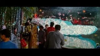 man and woman on couch in dim room — The Karate Kid