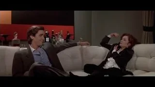 Man and woman on couch with wine — American Psycho