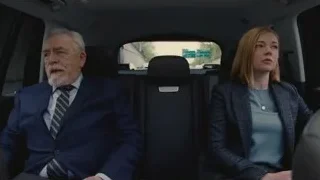 Man and woman sitting in car — Succession