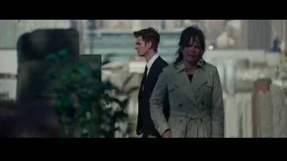 Man and woman walking on rooftop cityscape — The Amazing Spider Man 2