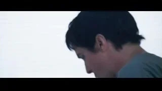 man brushing teeth in a room — The Big Short
