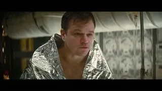 man covered in foil in room — Interstellar