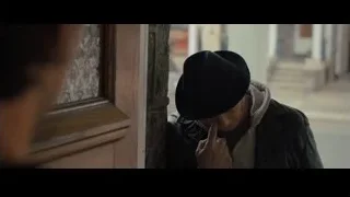 Man embracing and kissing elderly woman — Creed 2