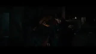 man holding child by fireplace in dark room — Spiderman: No Way Home