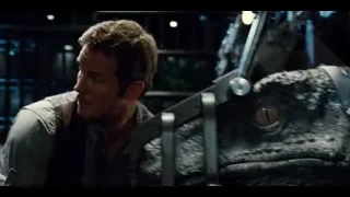 man holding large dinosaur head — Jurassic World