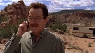 man holding phone in desert landscape — Breaking Bad