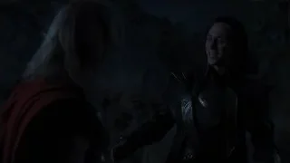 man holding sword talking to woman — The Avengers