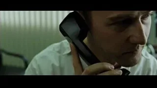 Man holding telephone in office, deep in thought — Fight Club