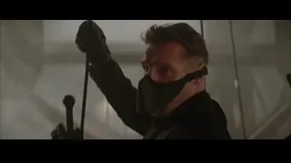 man in black mask holding sword — Batman