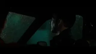 man in car looking out rainy window at night — Fight Club