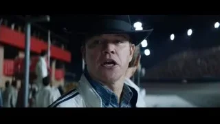 man in cowboy hat in stadium — Ford v Ferrari
