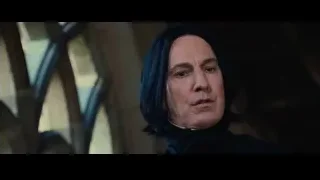 Man in dark coat speaking — Harry Potter and the Philosophers Stone