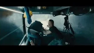 Man in dark room with man on floor — Furious Seven