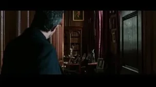 man in dark suit in wooden room — Now You See Me 2
