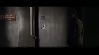 Man in front of Biocable Development Unit door — The Amazing Spider Man