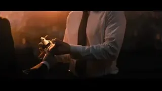 man in front of city skyline at sunset — John Wick: Chapter 4