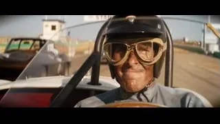 Man in helmet and goggles in vintage car — Ford v Ferrari