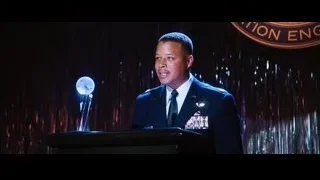 Man in military uniform speaking on stage — Iron Man
